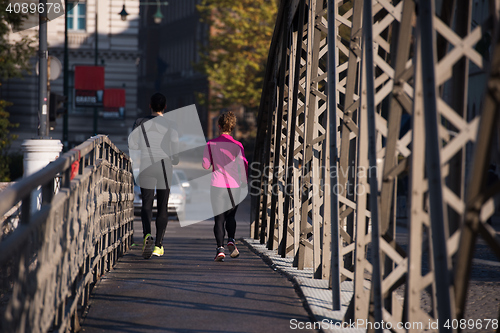 Image of young  couple jogging