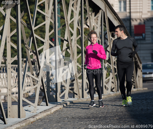 Image of young  couple jogging