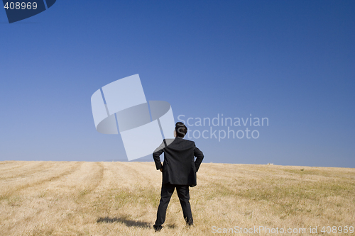 Image of Businessman looking to the future