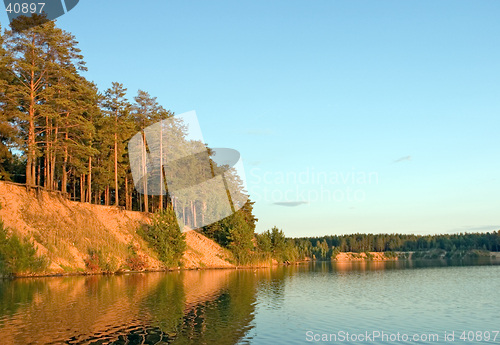 Image of Forest lake on sunset light