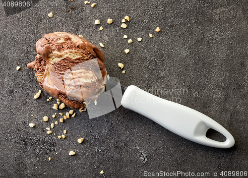 Image of chocolate ice cream on dark gray table