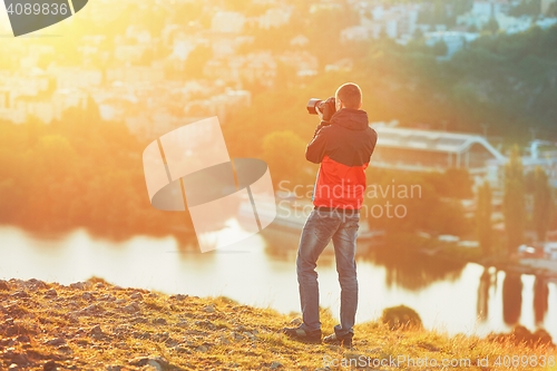 Image of Photographer at the sunrise