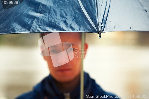 Image of Man in rainy day