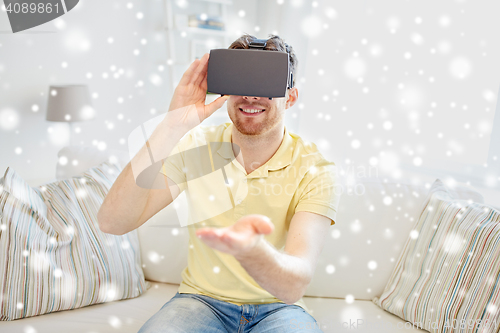 Image of young man in virtual reality headset or 3d glasses