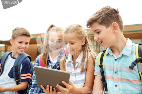 Image of group of happy elementary school students talking