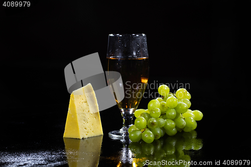 Image of Wine And Grapes On Black