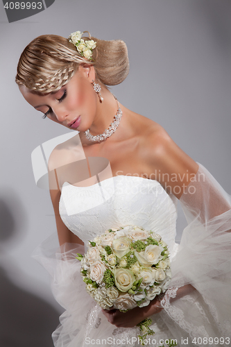 Image of Young Beautiful Woman In A Wedding Dress