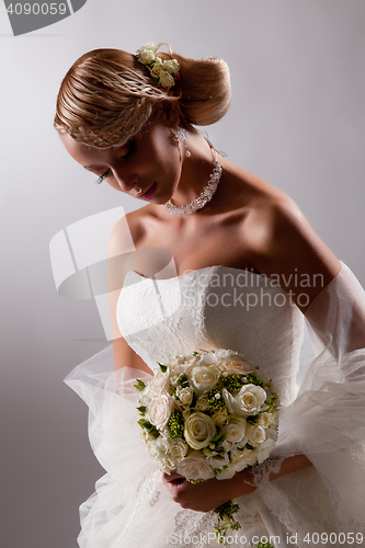 Image of Young Beautiful Woman In A Wedding Dress