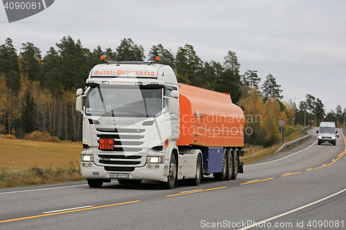 Image of Scania Semi Fuel Tanker among Traffic 