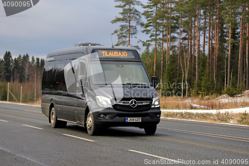 Image of Black Mercedes-Benz Sprinter Minibus on the Road