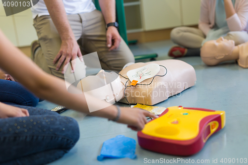 Image of First aid resuscitation course using AED.