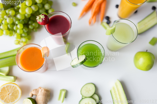 Image of glasses with different fruit or vegetable juices