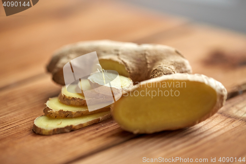 Image of close up of ginger root on wooden table