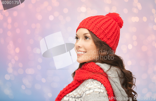 Image of young smiling woman in winter clothes