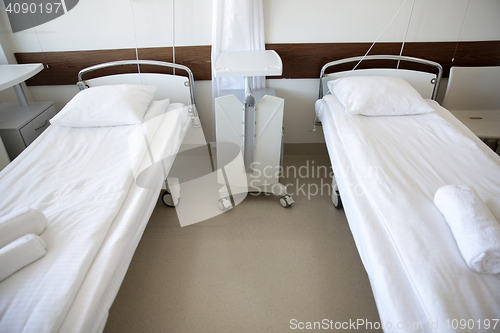 Image of hospital ward with clean empty beds