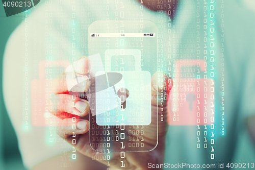 Image of close up of hand with security lock on smartphone