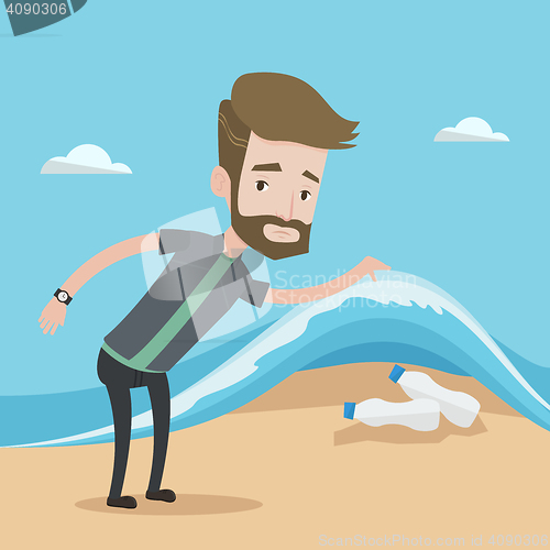 Image of Man showing plastic bottles under sea wave.