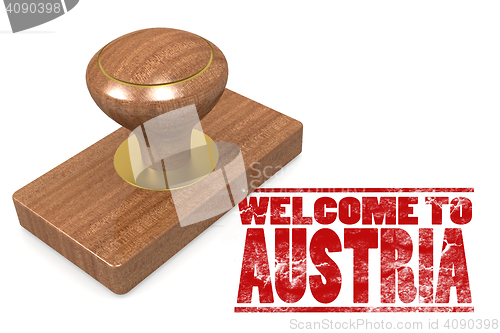 Image of Red rubber stamp with welcome to Austria