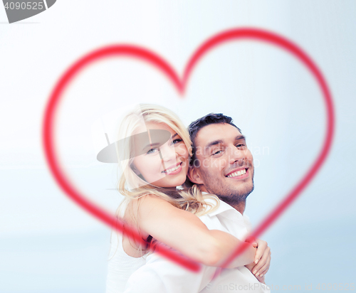 Image of couple having fun on the beach