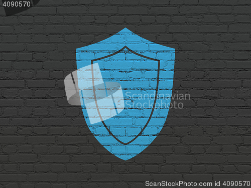 Image of Security concept: Shield on wall background