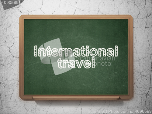 Image of Vacation concept: International Travel on chalkboard background
