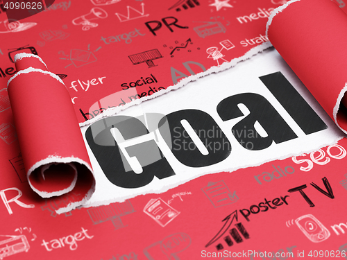 Image of Advertising concept: black text Goal under the piece of  torn paper