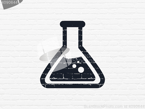 Image of Science concept: Flask on wall background