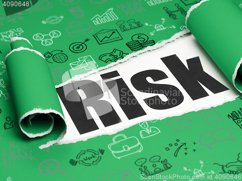 Image of Business concept: black text Risk under the piece of  torn paper