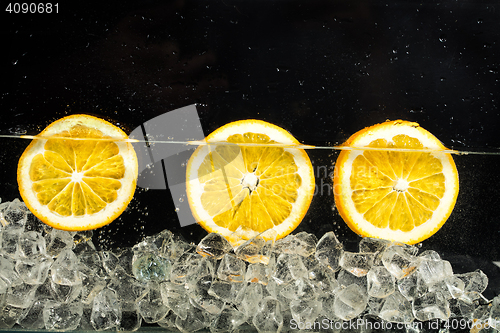 Image of Oranges, Water And Ice