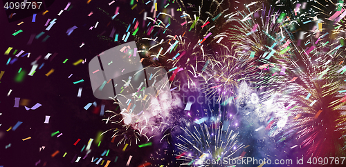 Image of multicolor fireworks and ticker tapes