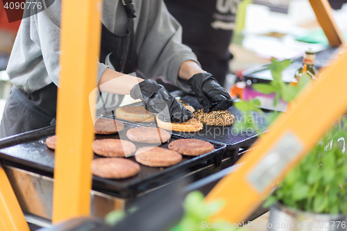 Image of Beef burgers ready to serve on food stall.