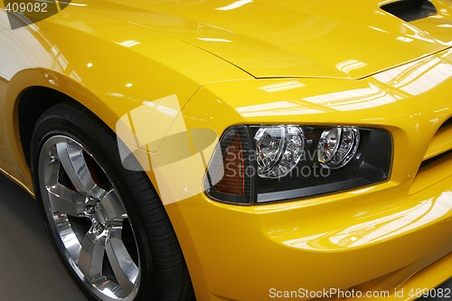 Image of Yellow muscle car