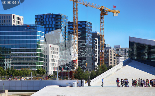 Image of OSLO, NORWAY – AUGUST 17, 2016: Tourist on the Oslo Opera Hous