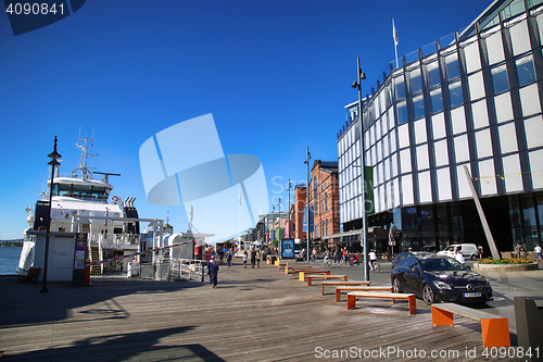 Image of OSLO, NORWAY – AUGUST 17, 2016: People walking on modern distr