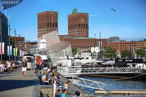 Image of OSLO, NORWAY – AUGUST 17, 2016: People walking on modern distr