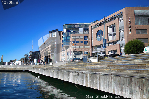 Image of OSLO, NORWAY – AUGUST 17, 2016: People walking on modern distr