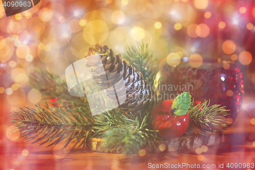 Image of christmas fir branch decoration and candle lantern