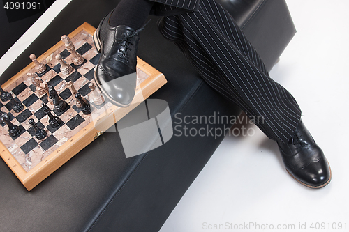 Image of Man\'s Legs And Chess