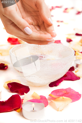 Image of Female tender hands making bowl