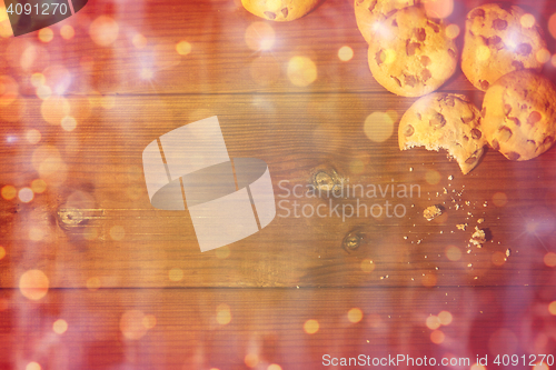 Image of close up of oat cookies on wooden table