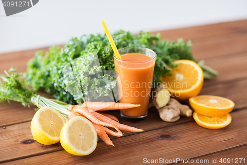 Image of glass of carrot juice, fruits and vegetables