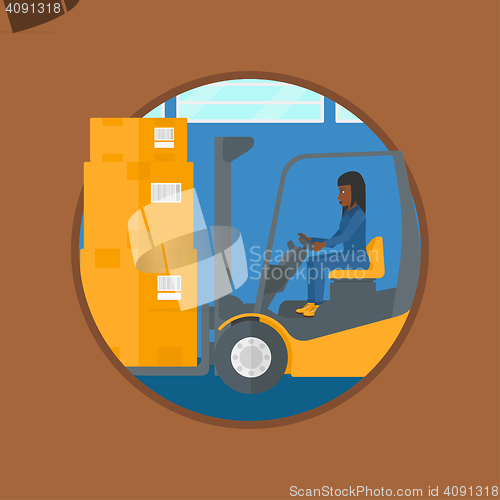 Image of Warehouse worker moving load by forklift truck.