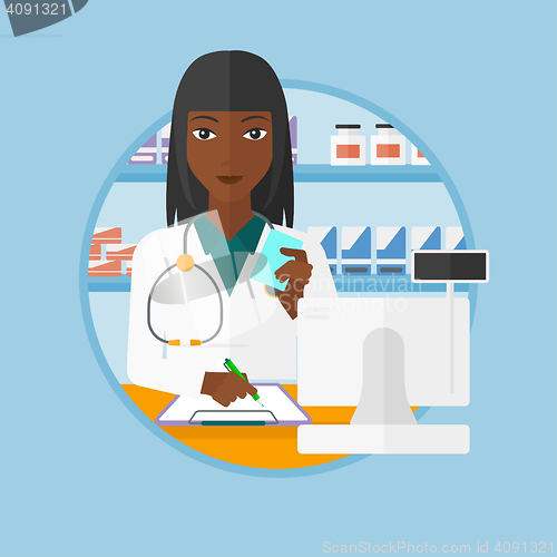 Image of Pharmacist writing prescription.