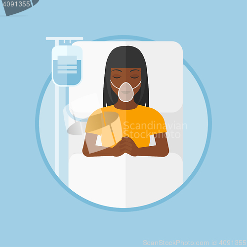 Image of Patient lying in hospital bed with oxygen mask.