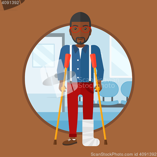 Image of Man with broken leg and crutches.