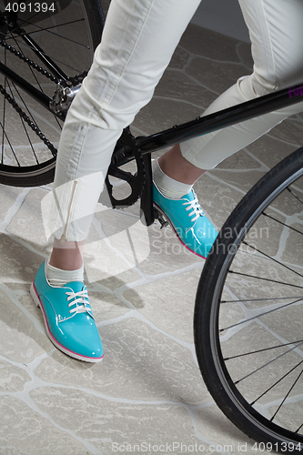 Image of Woman\'s Legs And Bicycle