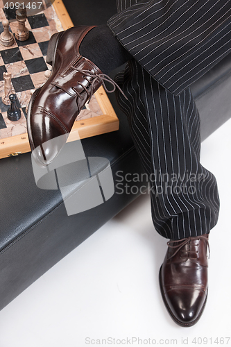 Image of Man\'s Legs And Chess