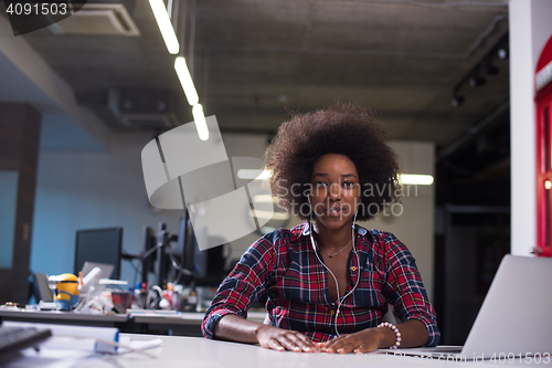 Image of portrait of a young successful African-American woman in modern 