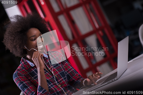 Image of portrait of a young successful African-American woman in modern 