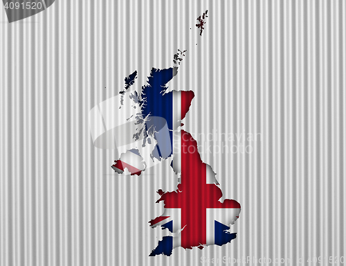 Image of Map and flag of Great Britain on corrugated iron,